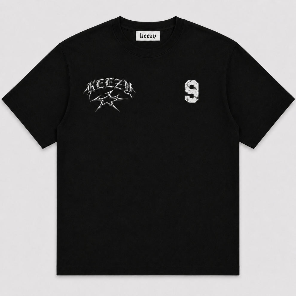 A black short-sleeve t-shirt with a white 'keezy' band logo and a distressed white number '9' printed on the chest, displayed flat against a light gray background.